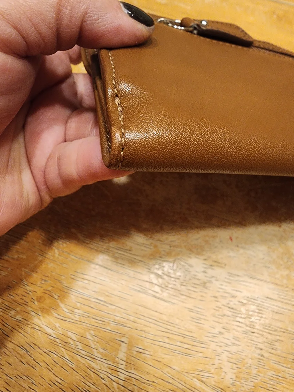 vintage Coach Soho Buckle Wallet crafted in brown leather prominent front Buckle